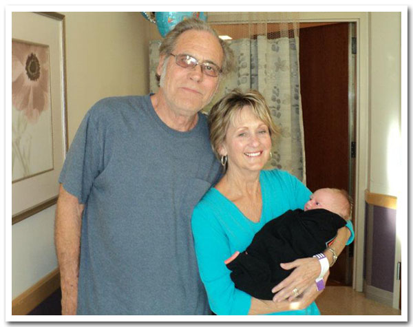 Jim and Carol Canfield and Little Chaz Michael Manuel